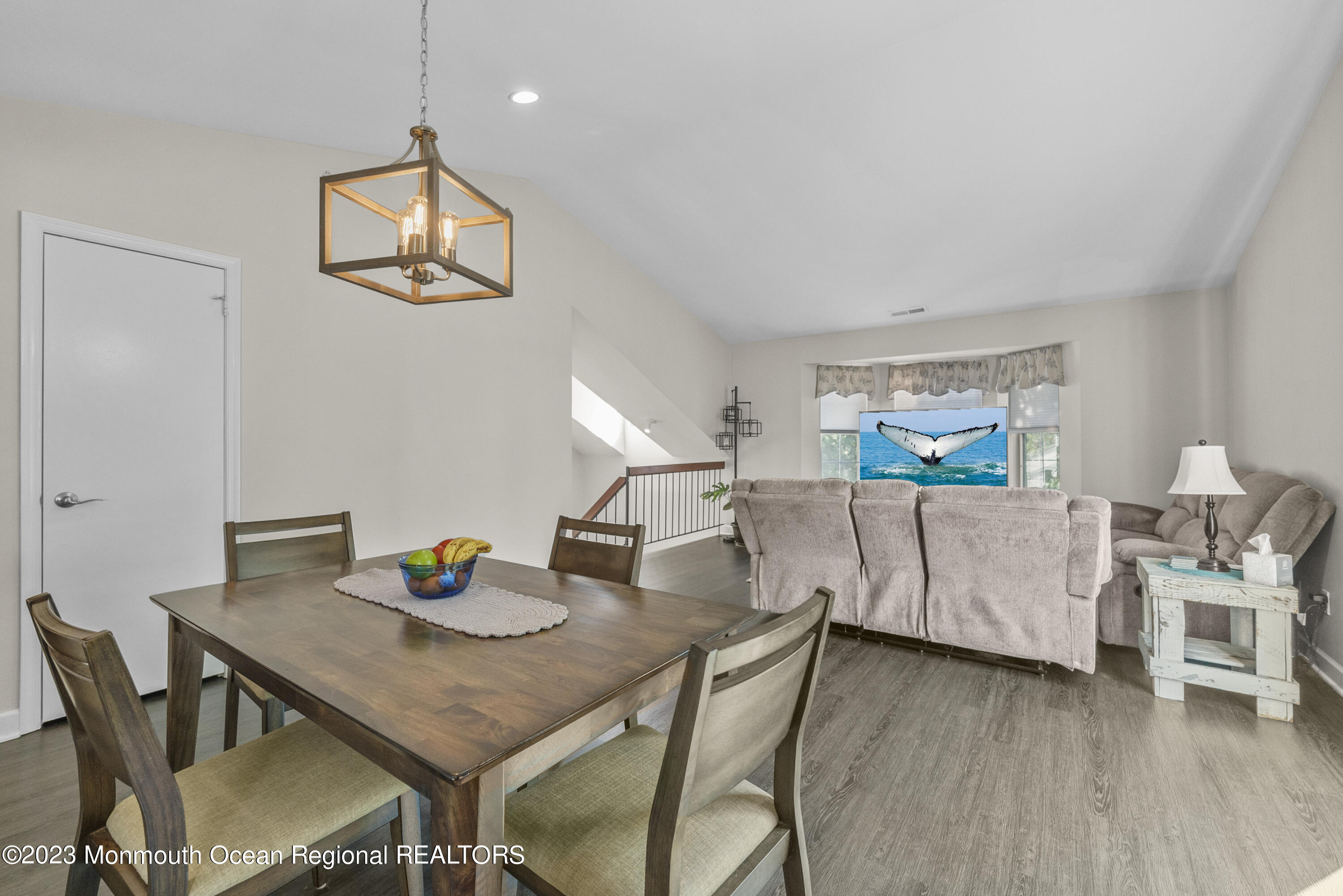 186 Tulip Lane Freehold, NJ 07728 - Photo 7 of 18 a view of a dining room with furniture and wooden floor