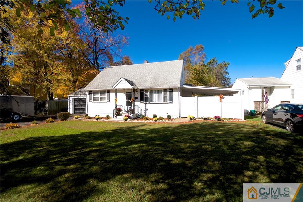 71 South Pennington Road New Brunswick, NJ 08901 - Photo 2 of 24 a front view of a house with a garden