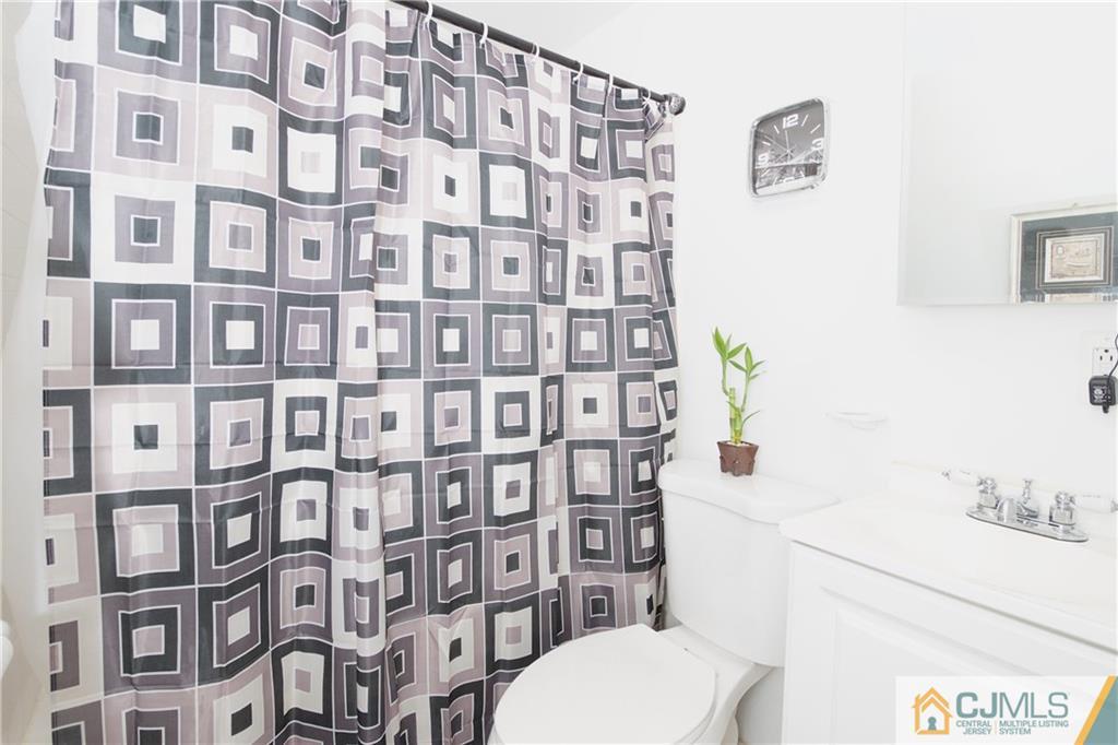 71 South Pennington Road New Brunswick, NJ 08901 - Photo 18 of 24 a bathroom with a sink toilet and shower