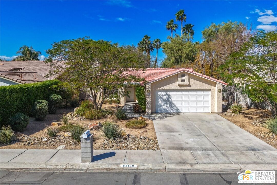 68130 Hermosillo Road Cathedral City, CA 92234 - Photo 1 of 49 a front view of a house with a yard
