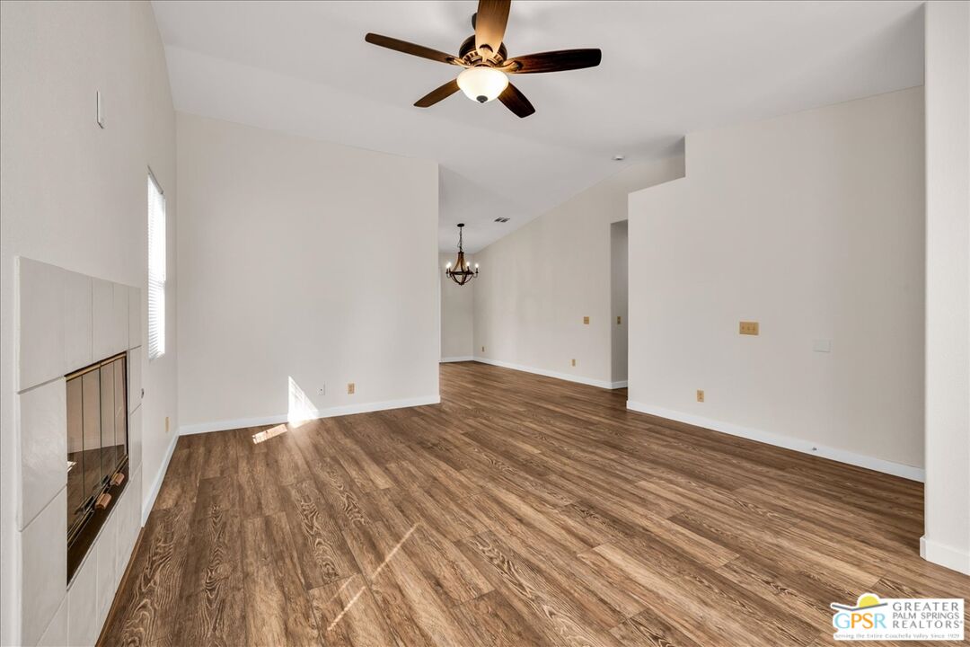 68130 Hermosillo Road Cathedral City, CA 92234 - Photo 14 of 49 a view of empty room with wooden floor