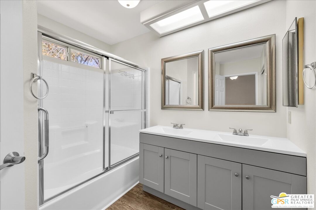 68130 Hermosillo Road Cathedral City, CA 92234 - Photo 23 of 49 a bathroom with a double vanity sink mirror and shower