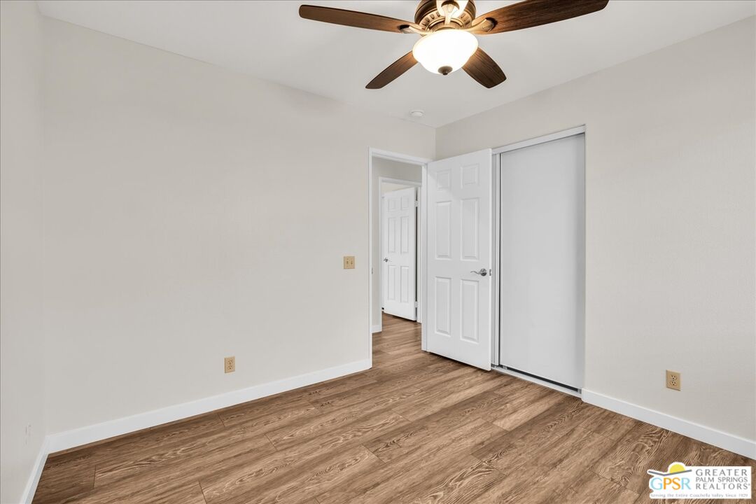 68130 Hermosillo Road Cathedral City, CA 92234 - Photo 31 of 49 wooden floor in an empty room