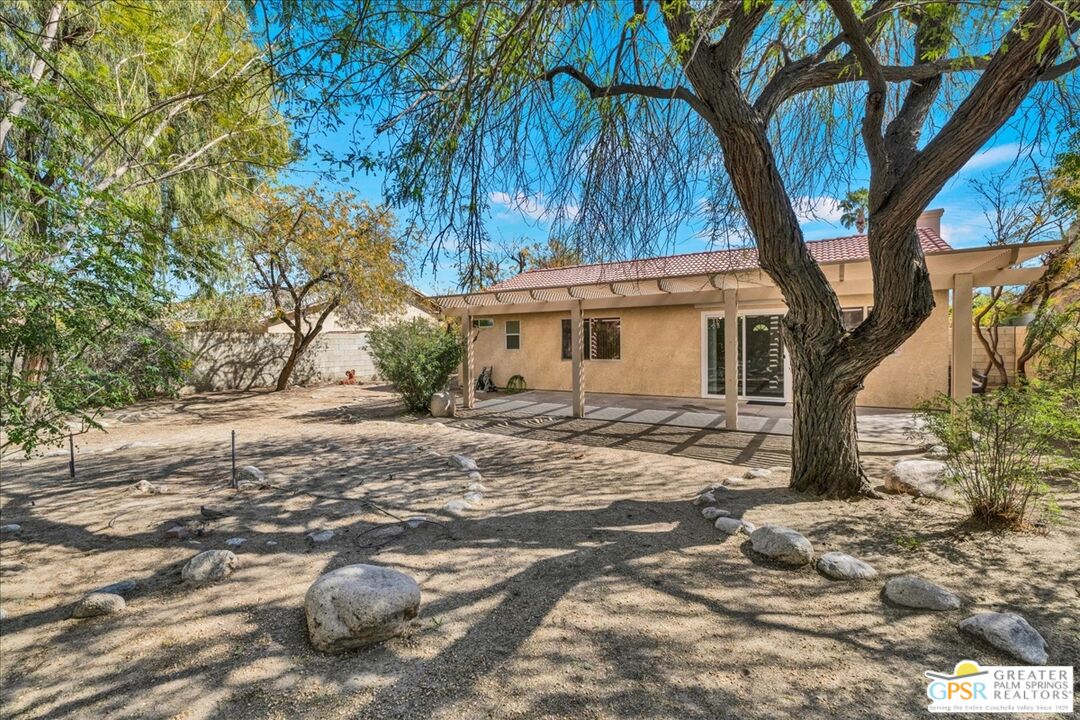 68130 Hermosillo Road Cathedral City, CA 92234 - Photo 38 of 49 a view of a house with a yard