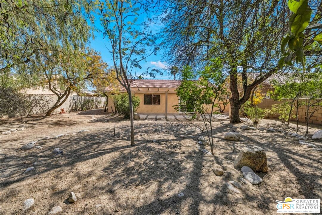 68130 Hermosillo Road Cathedral City, CA 92234 - Photo 42 of 49 a view of a house with a yard