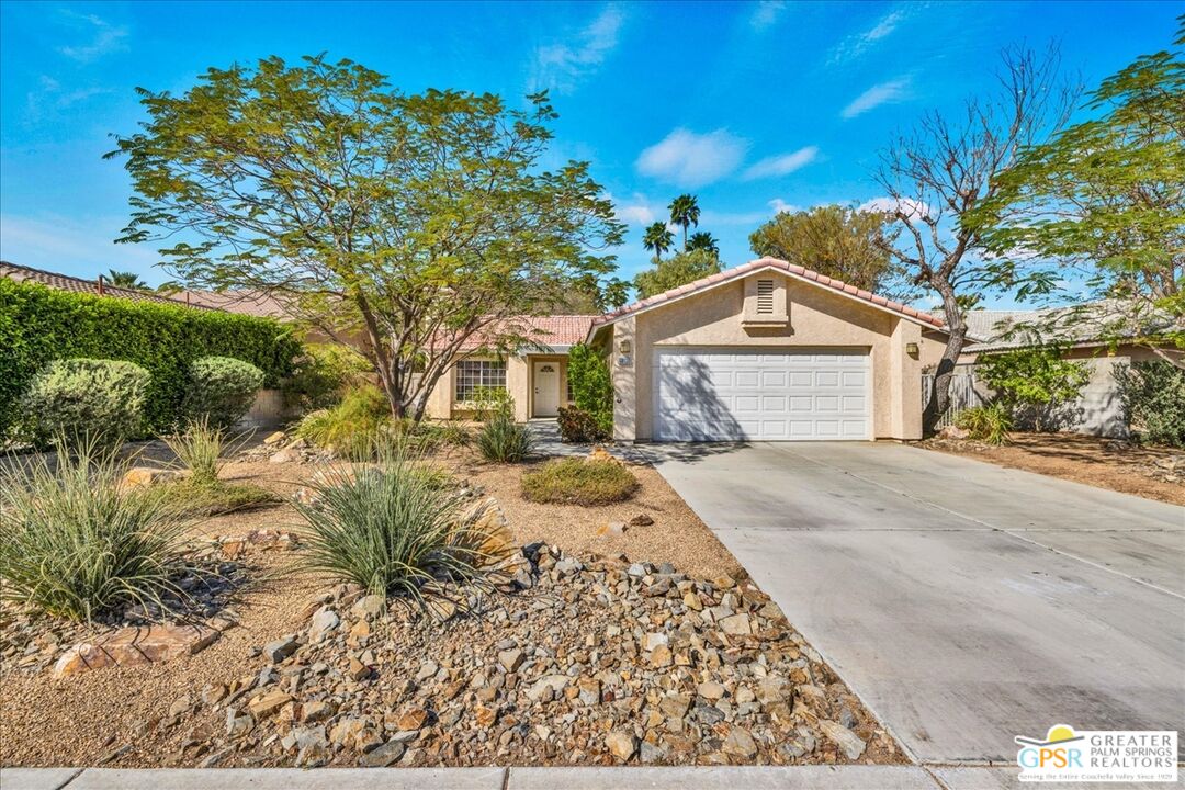 68130 Hermosillo Road Cathedral City, CA 92234 - Photo 8 of 49 a front view of a house with a yard