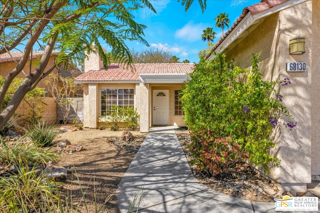 68130 Hermosillo Road Cathedral City, CA 92234 - Photo 9 of 49 a front view of a house with garden