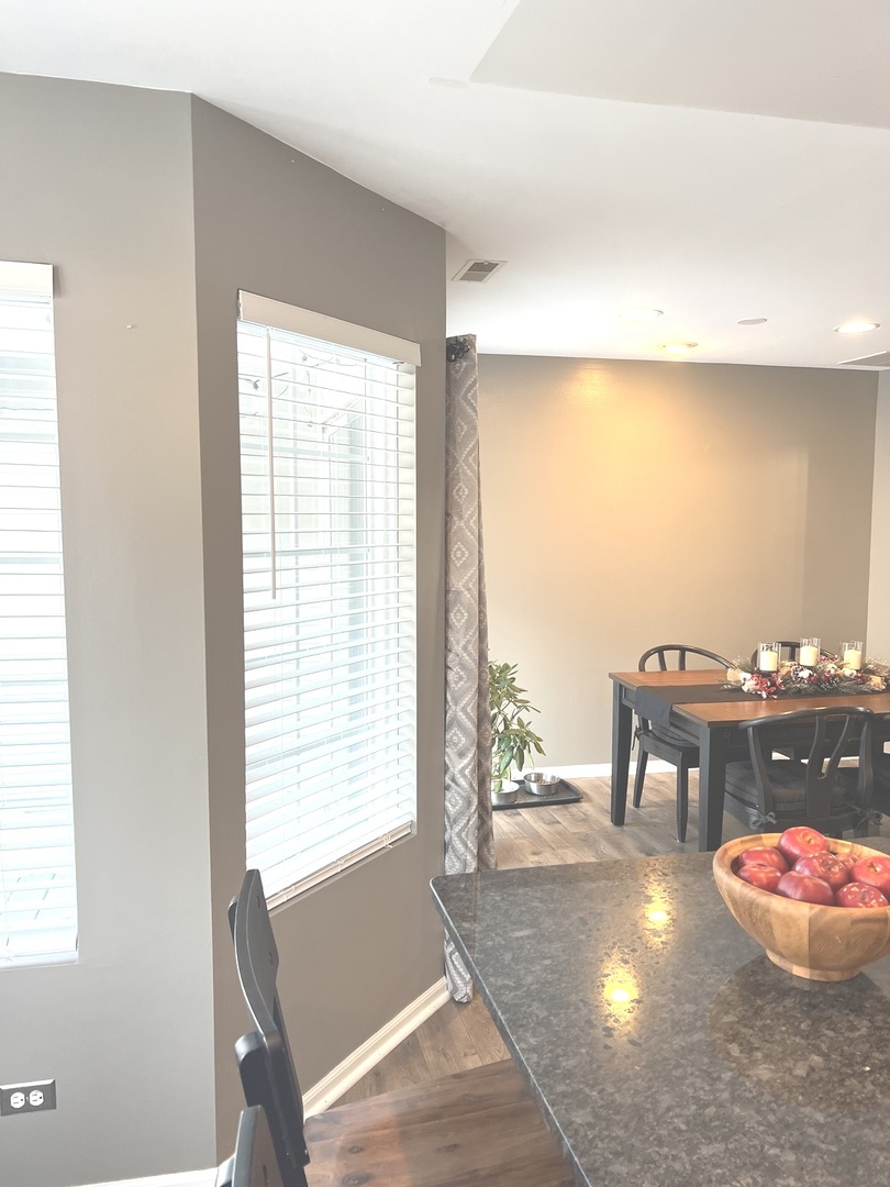 2233 Dawson Lane Algonquin, IL 60102 - Photo 12 of 52 a view of a room with a dining table and a large window
