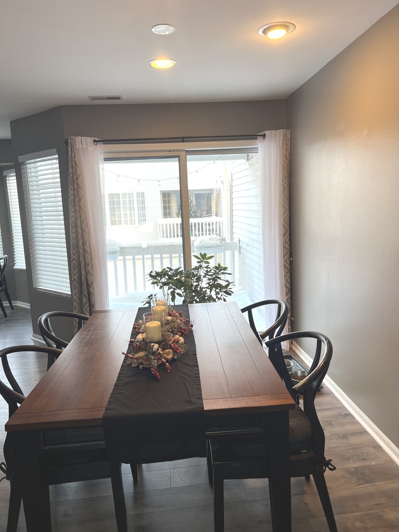 2233 Dawson Lane Algonquin, IL 60102 - Photo 14 of 52 a view of a dining room with furniture window and outside view