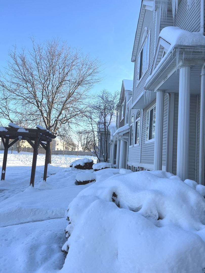 2233 Dawson Lane Algonquin, IL 60102 - Photo 3 of 52 a view of a yard with a snow