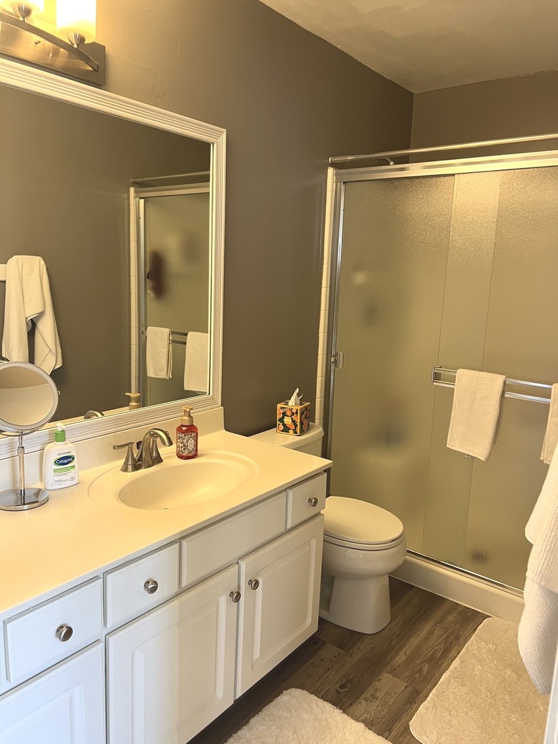 2233 Dawson Lane Algonquin, IL 60102 - Photo 37 of 52 a bathroom with a sink and a mirror