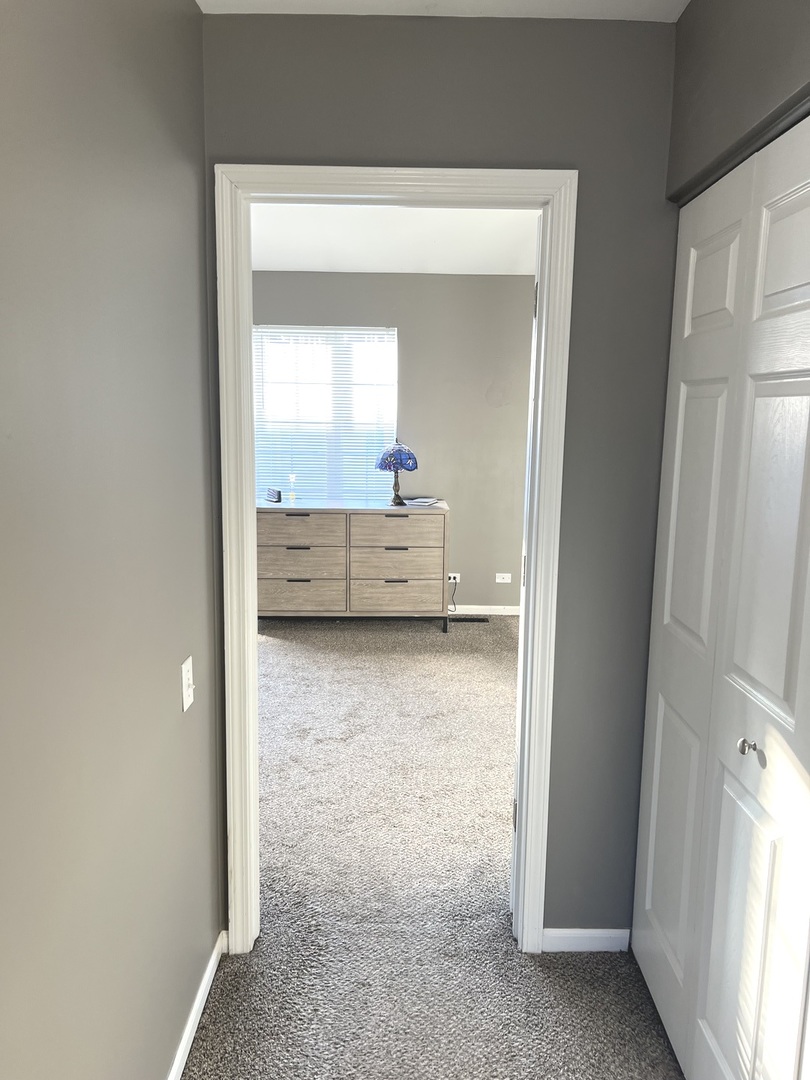 2233 Dawson Lane Algonquin, IL 60102 - Photo 40 of 52 a view of living room with a baby crib