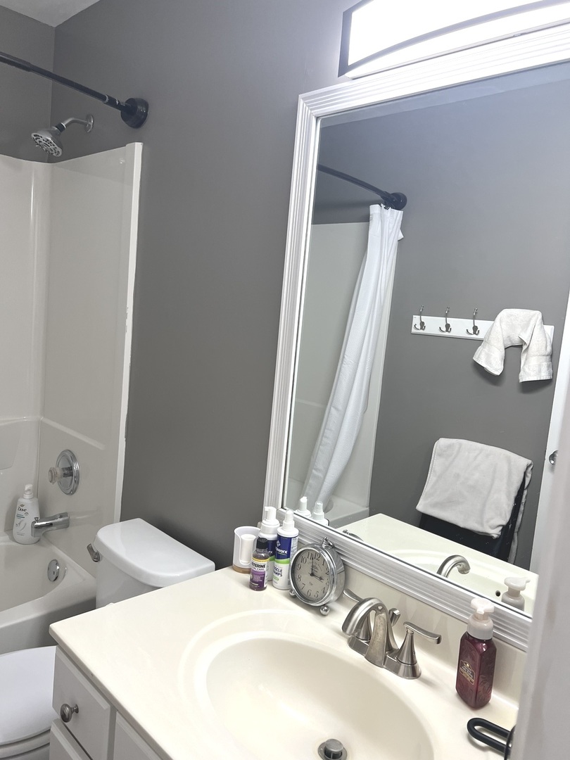 2233 Dawson Lane Algonquin, IL 60102 - Photo 42 of 52 a bathroom with a sink and a mirror