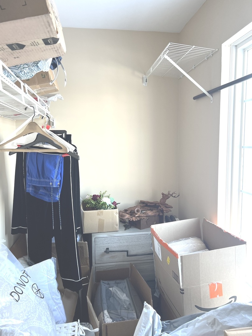 2233 Dawson Lane Algonquin, IL 60102 - Photo 47 of 52 a living room with a couch and a table