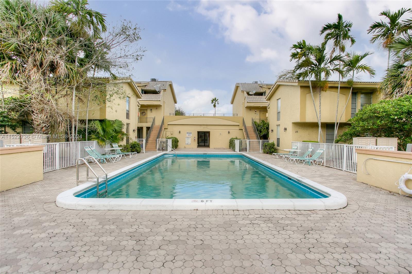 8401 West Sample Road, Unit 35 Coral Springs, FL 33065 - Photo 10 of 13 a view of outdoor space yard swimming pool and porch