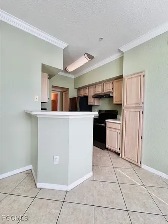 a kitchen with a cabinets a sink and a counter top space
