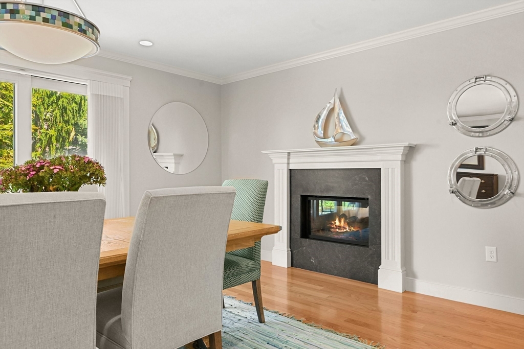 11 Whites Ferry Landing Marshfield, MA 02050 - Photo 13 of 42 a living room with furniture and a fireplace