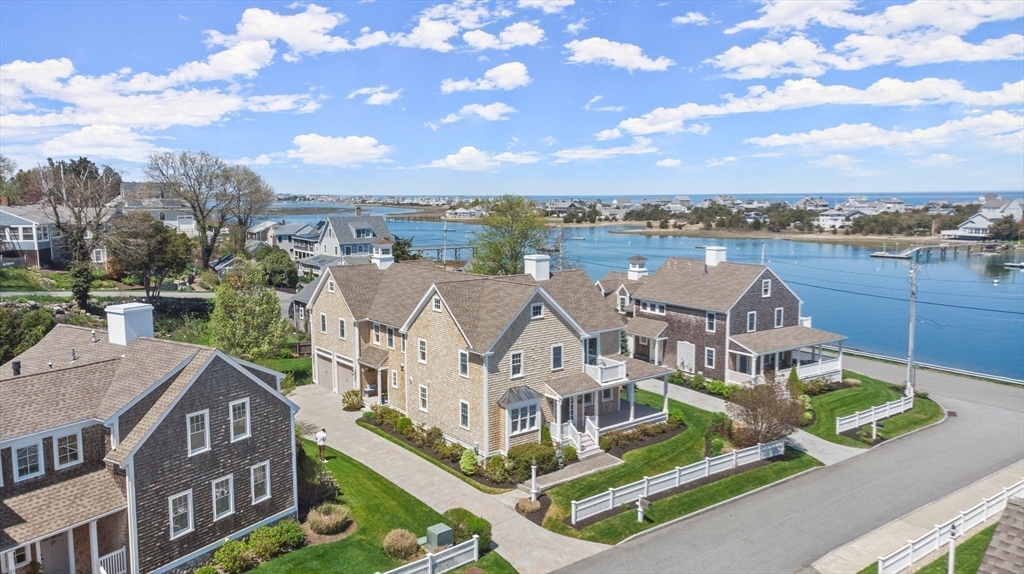 11 Whites Ferry Landing Marshfield, MA 02050 - Photo 36 of 42 an aerial view of a house with a big yard and large trees