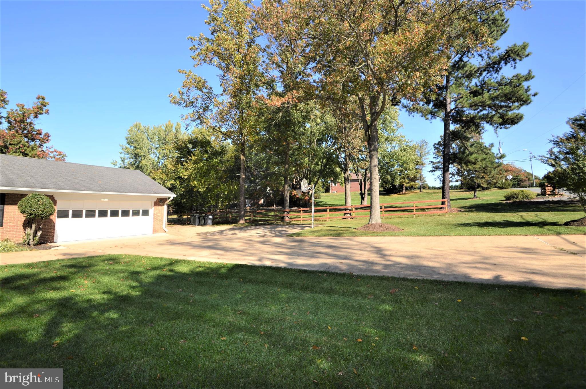12614 Oxon Road Herndon, VA 20171 - Photo 3 of 71 a view of a house with a big yard
