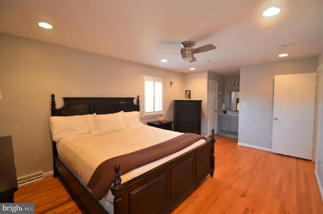 a view of a kitchen cabinets and chandelier