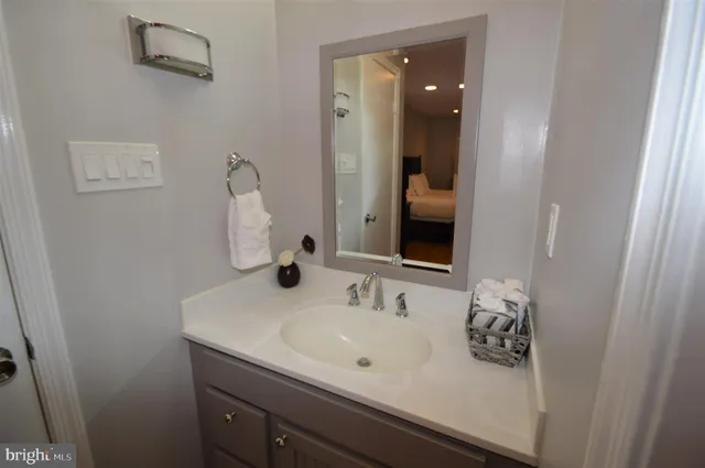 a view of walk in closet with washer and dryer