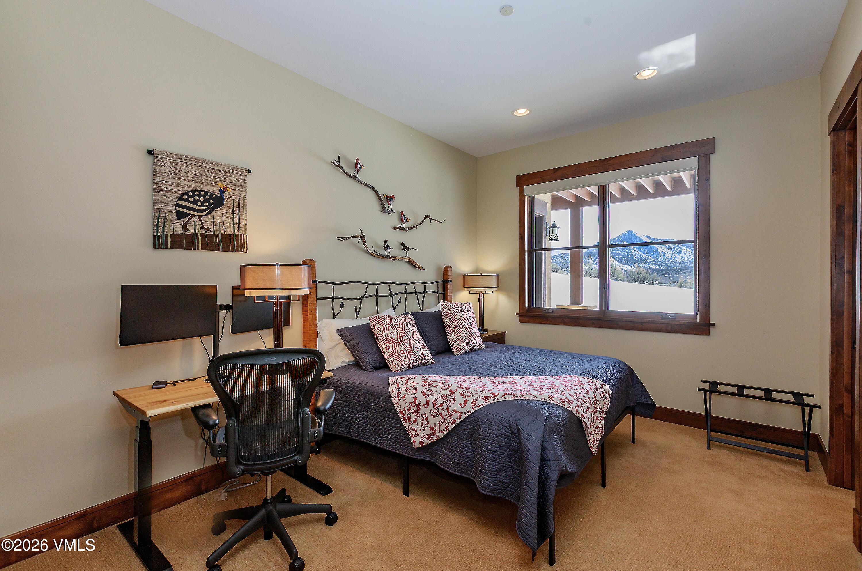 2753 East Haystacker Drive Eagle, CO 81631 - Photo 36 of 41 a bedroom with a bed and a window