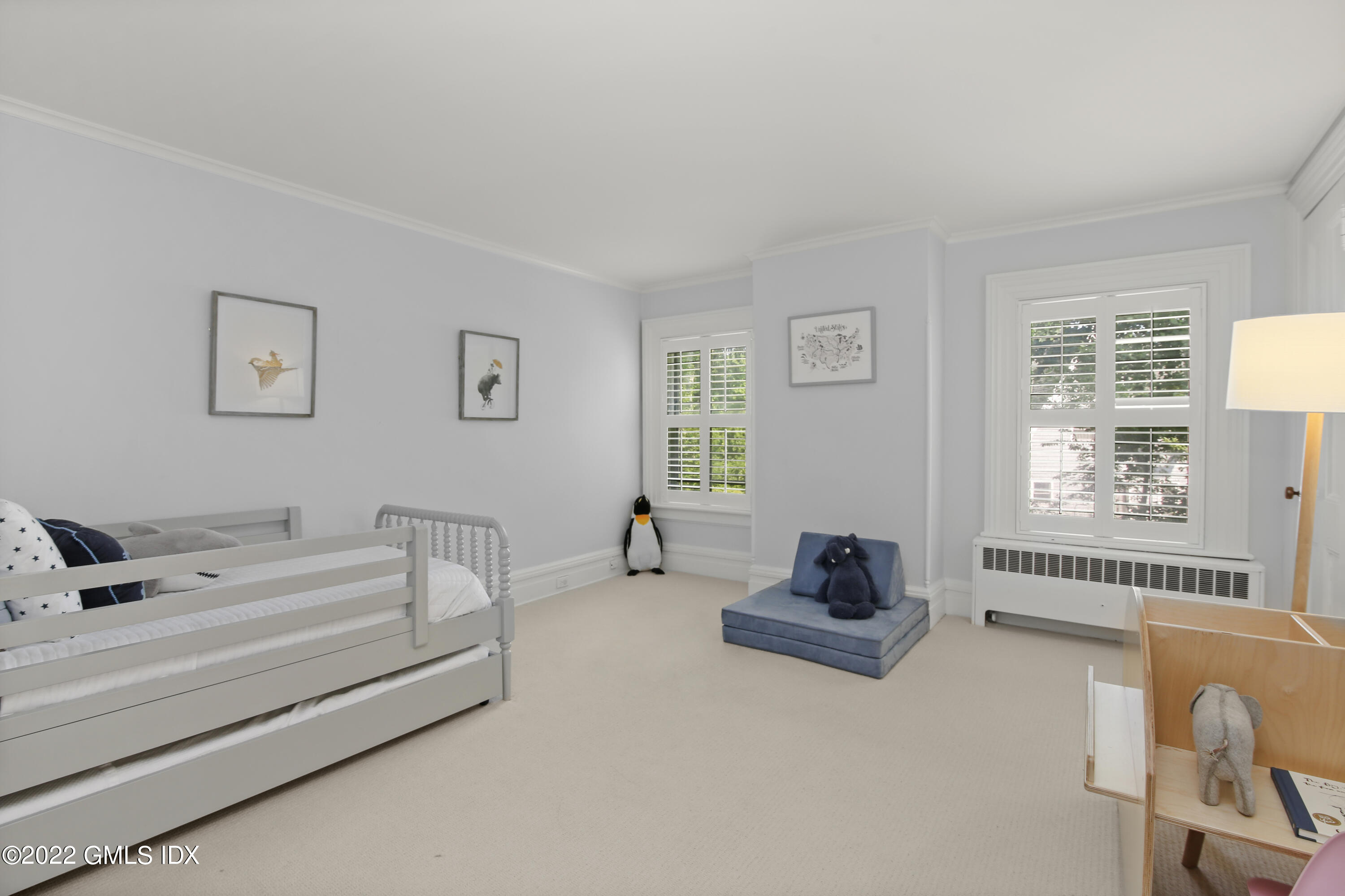 123 Riverside Avenue Riverside, CT 06878 - Photo 13 of 23 a bedroom with furniture and a window