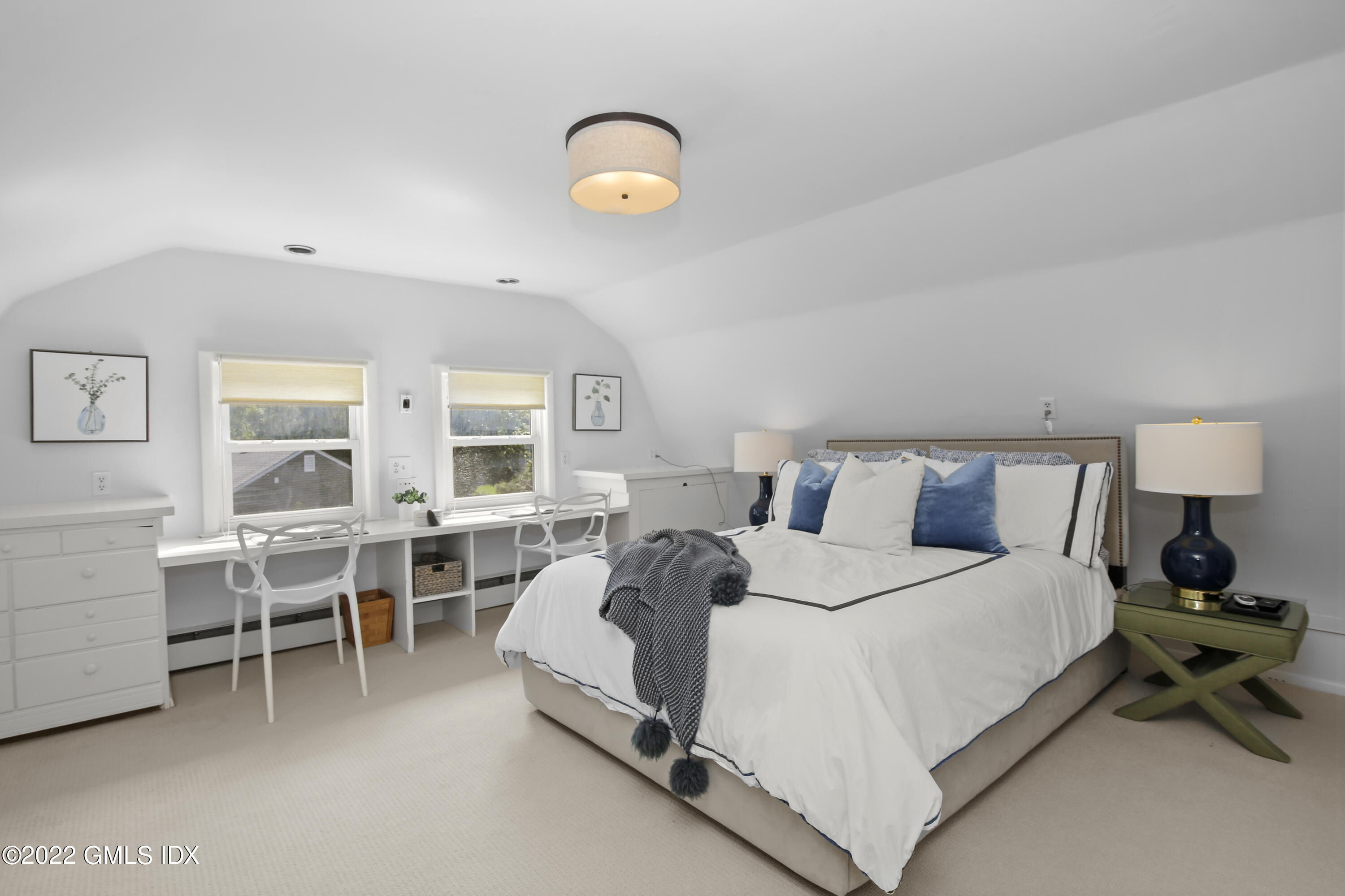 123 Riverside Avenue Riverside, CT 06878 - Photo 15 of 23 a bedroom with bed and a window
