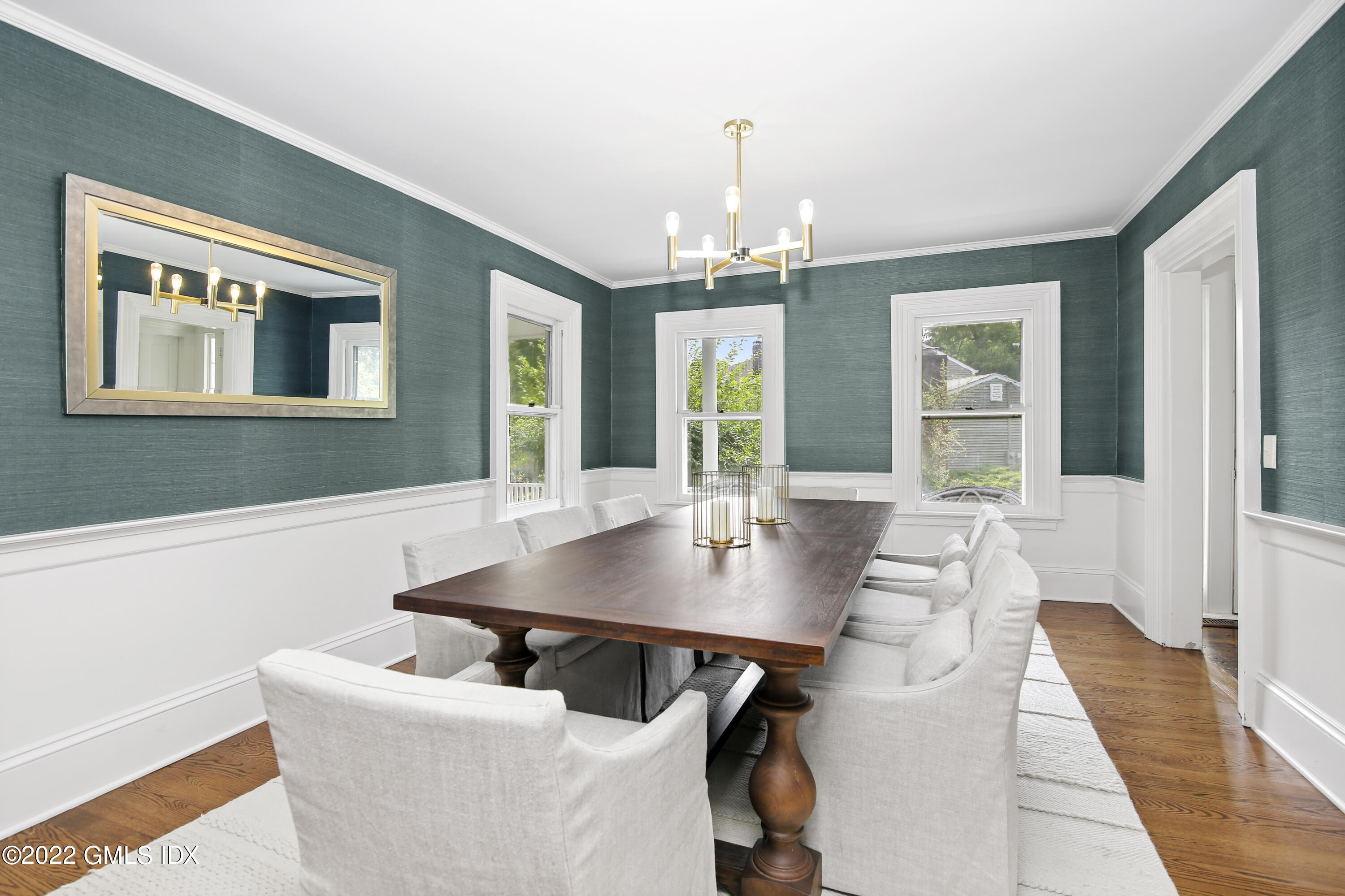 123 Riverside Avenue Riverside, CT 06878 - Photo 4 of 23 a view of a dining room with furniture and wooden floor