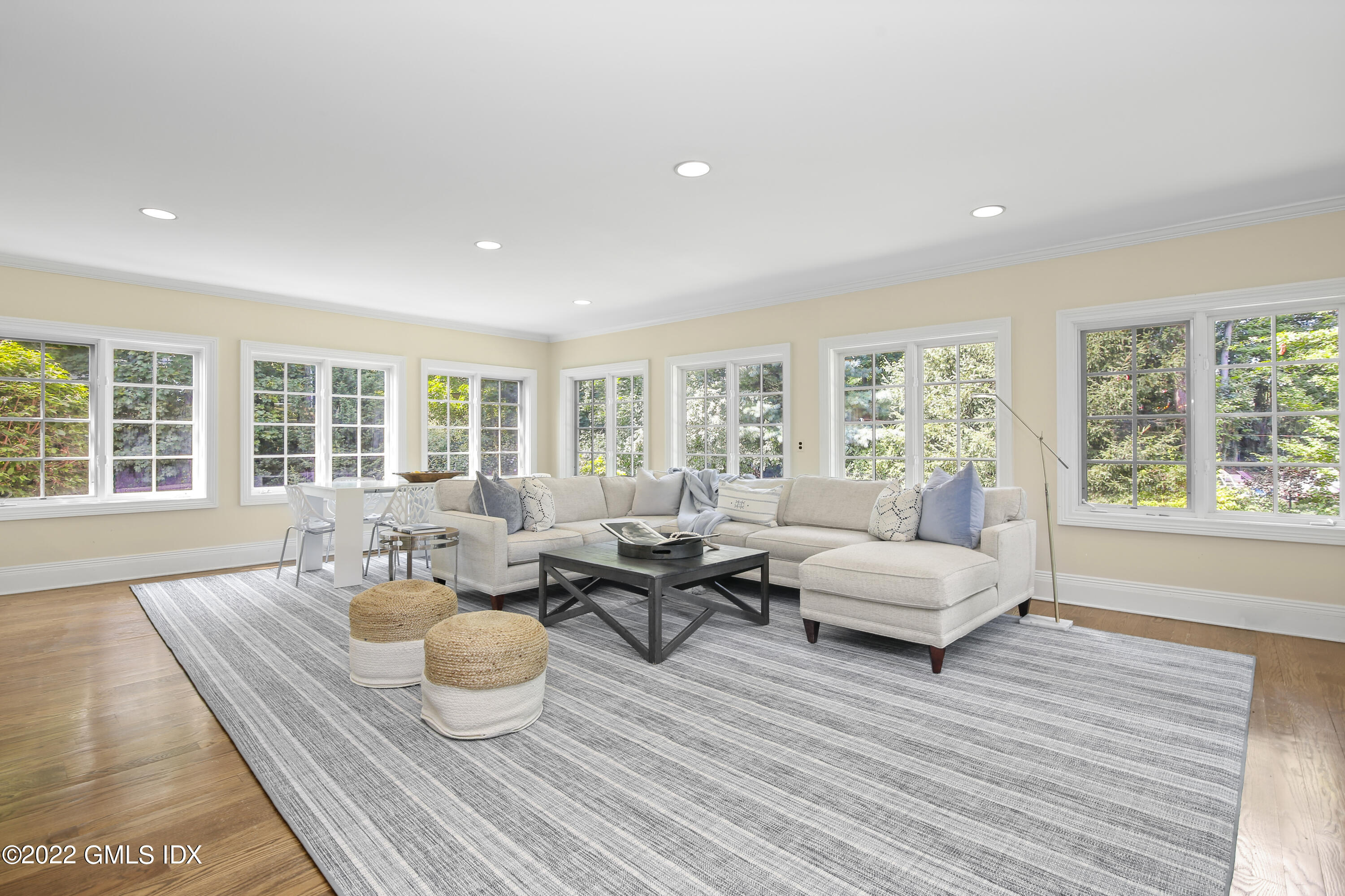 123 Riverside Avenue Riverside, CT 06878 - Photo 8 of 23 a living room with furniture and a large window