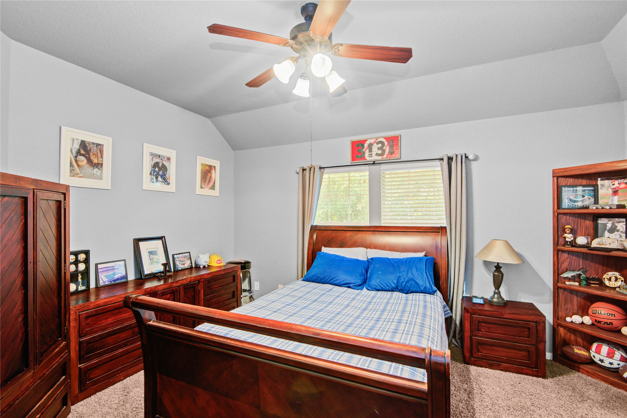 6007 Valhalla Drive Spring, TX 77379 - Photo 23 of 37 This spacious secondary bedroom features abundant natural light and direct access to the shared Jack-and-Jill bath.