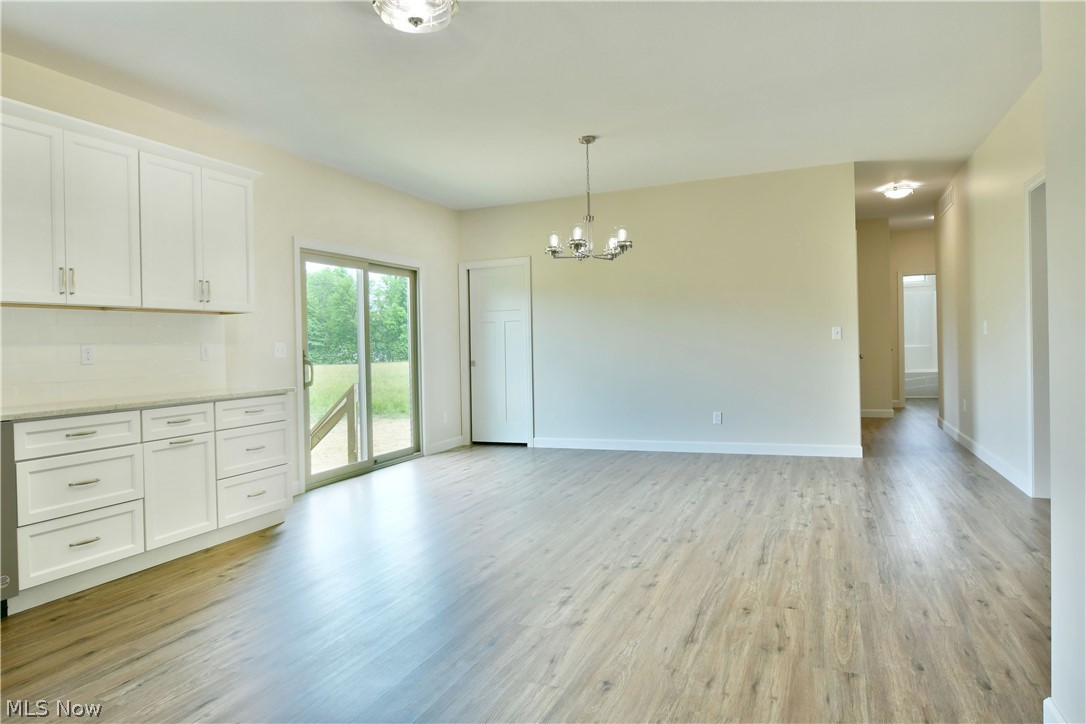 6834 Palmyra Road Southwest Warren, OH 44481 - Photo 12 of 33 Virtually Staged Dining Area