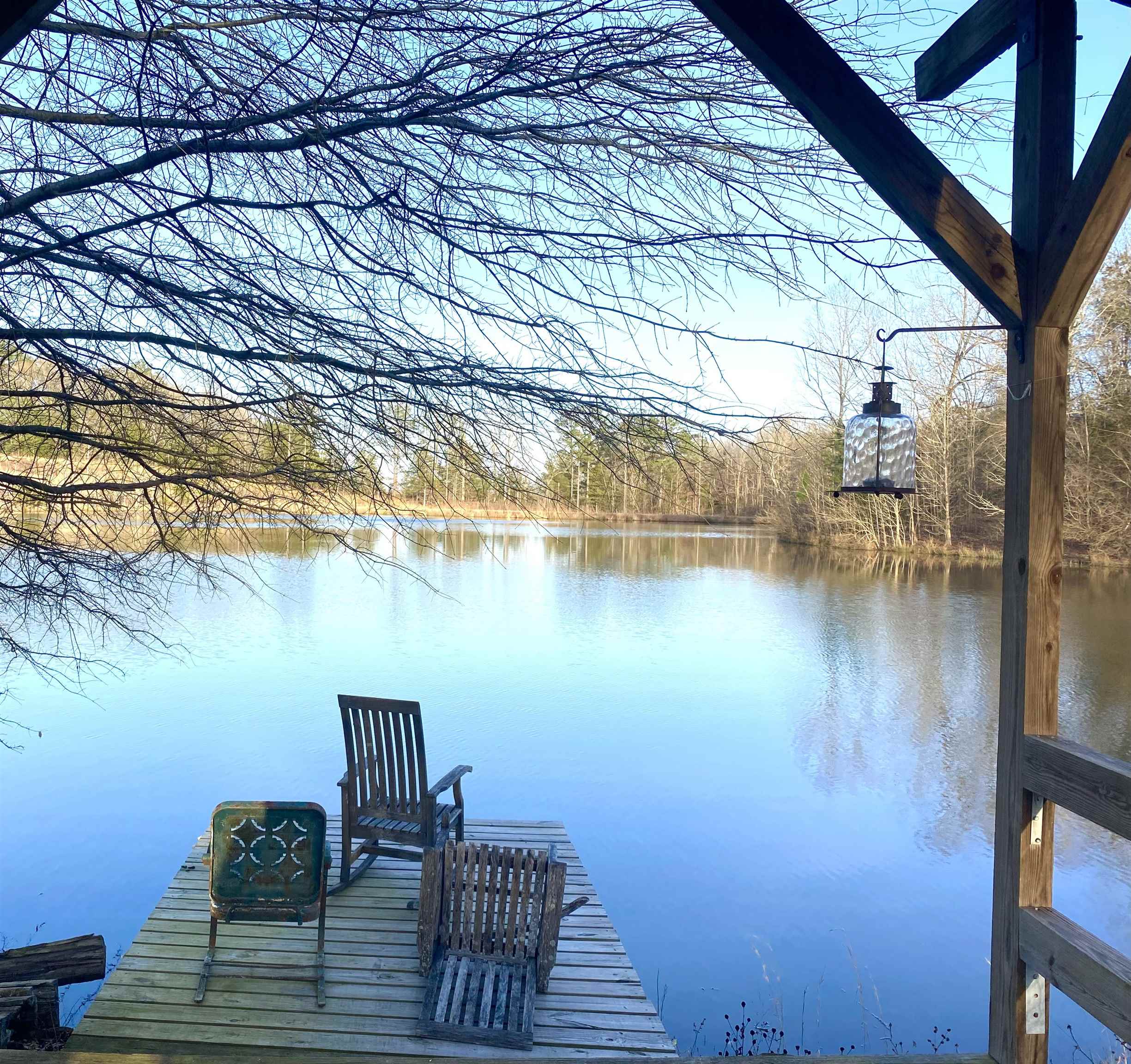 335 Gentry Chapel Road Middleton, TN 38052 - Photo 6 of 11 a view of balcony with two chairs and a table