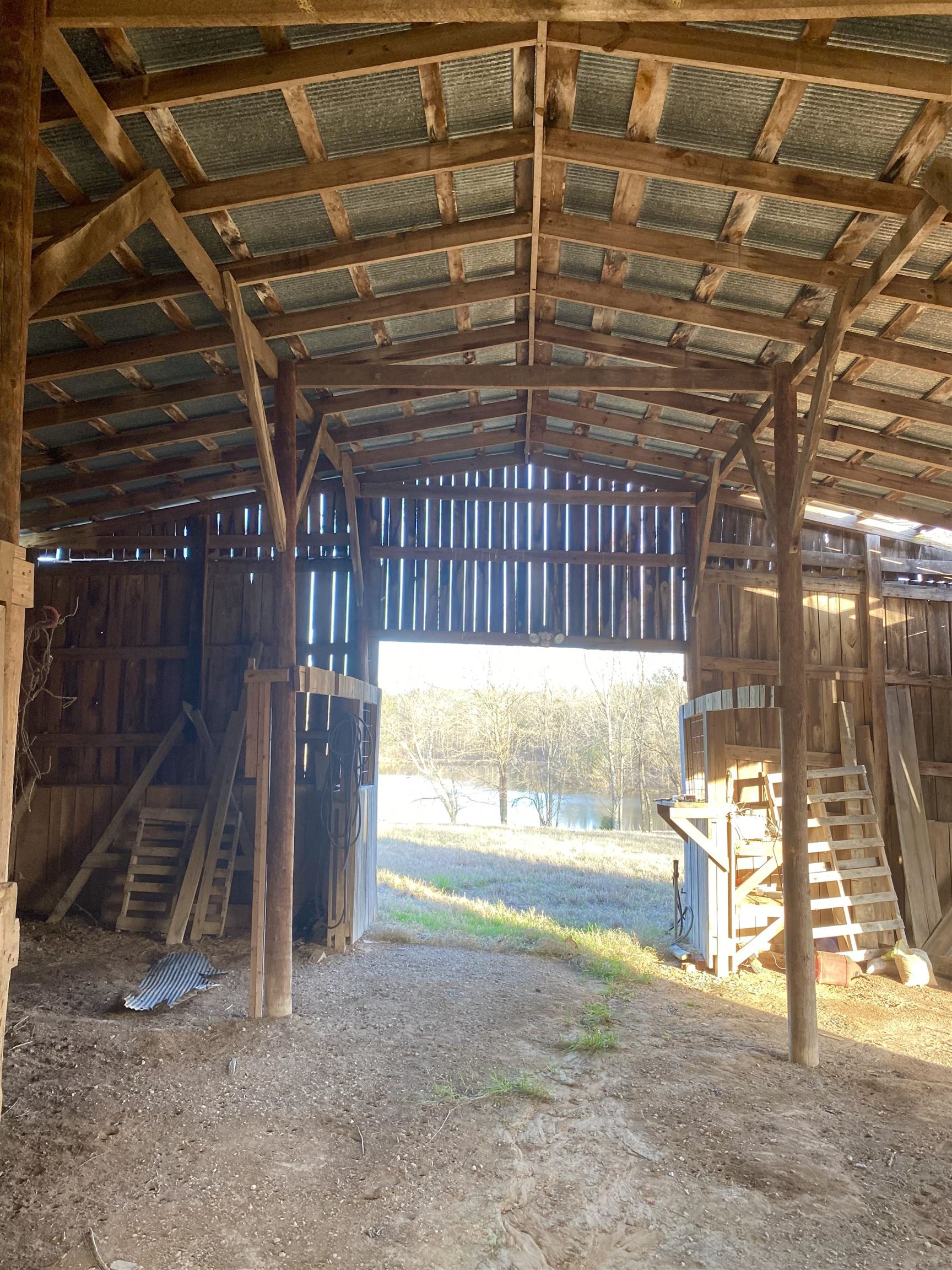 335 Gentry Chapel Road Middleton, TN 38052 - Photo 7 of 11 a view of a room with wooden walls