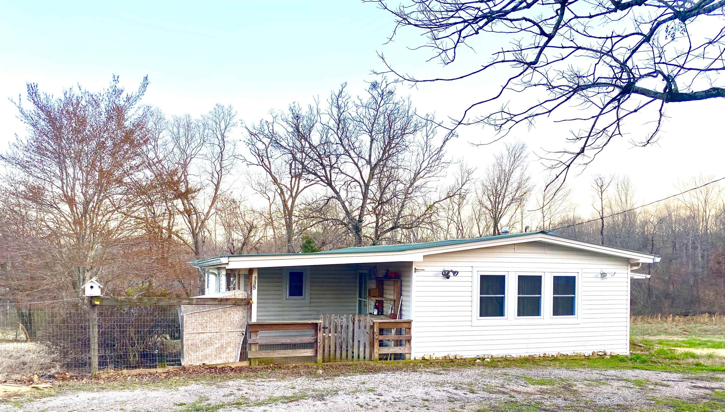 335 Gentry Chapel Road Middleton, TN 38052 - Photo 10 of 11 a front view of a house with garden
