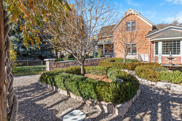 390 North 100 West Monroe, UT 84754 - Photo 53 of 167 Back of property with brick siding and roof with shingles