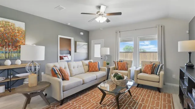 a view of a dining room with furniture and a kitchen