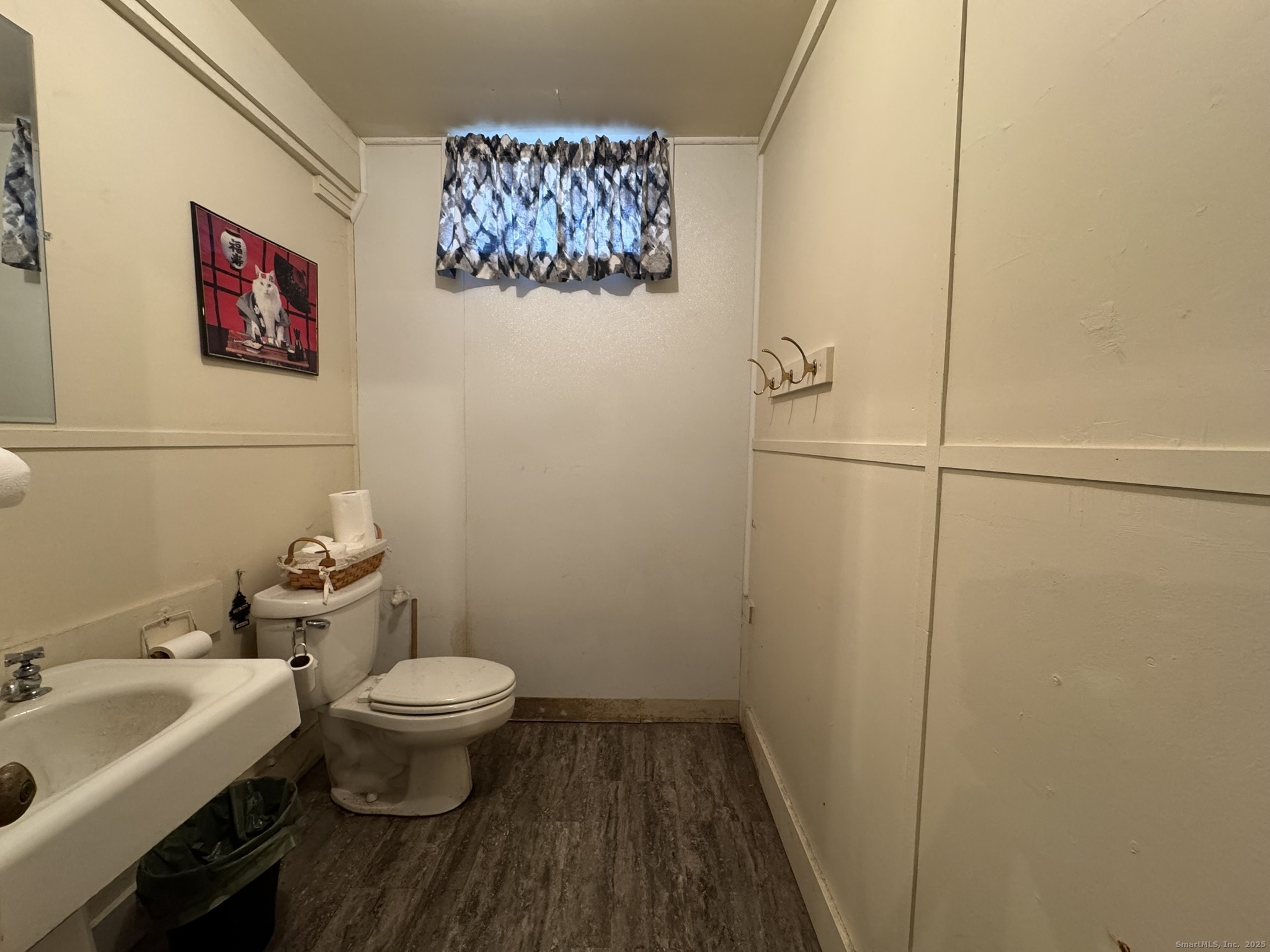 565 High Street Middletown, CT 06457 - Photo 21 of 24 a bathroom with a sink and a toilet