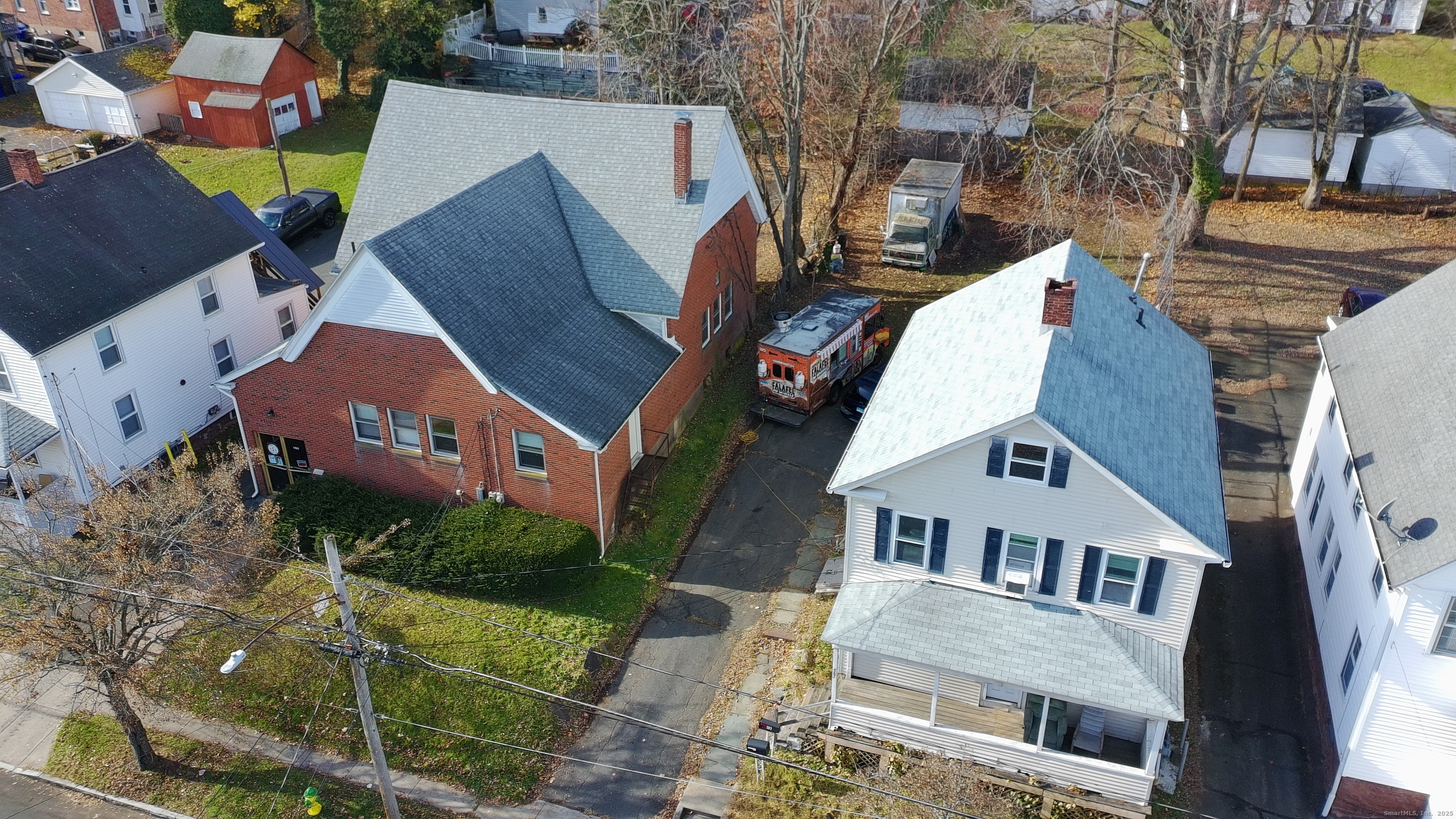 565 High Street Middletown, CT 06457 - Photo 5 of 24 an aerial view of a house with garden space and street view