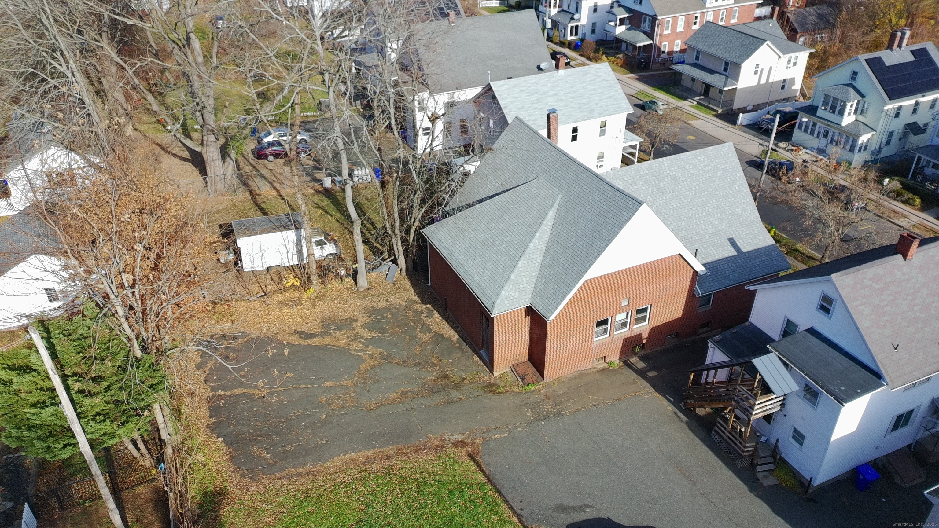 565 High Street Middletown, CT 06457 - Photo 7 of 24 an aerial view of a house with a yard