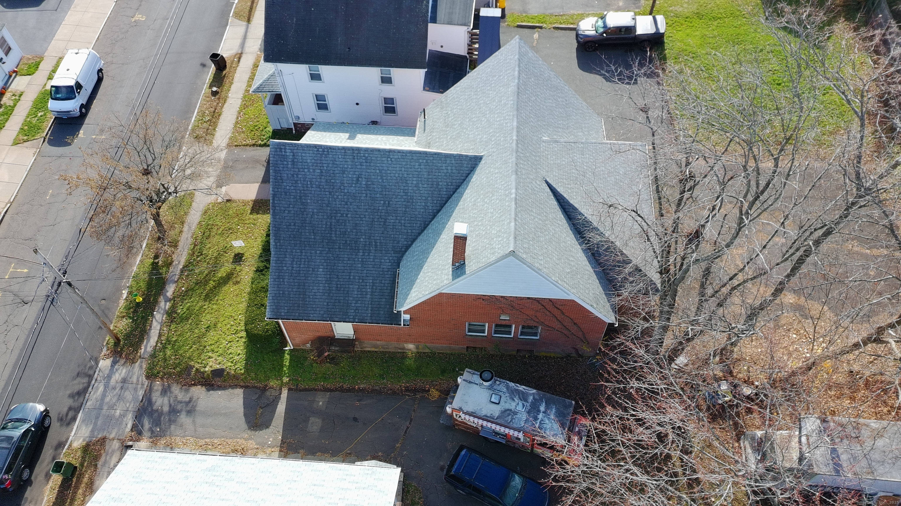 565 High Street Middletown, CT 06457 - Photo 8 of 24 an aerial view of a house with a yard