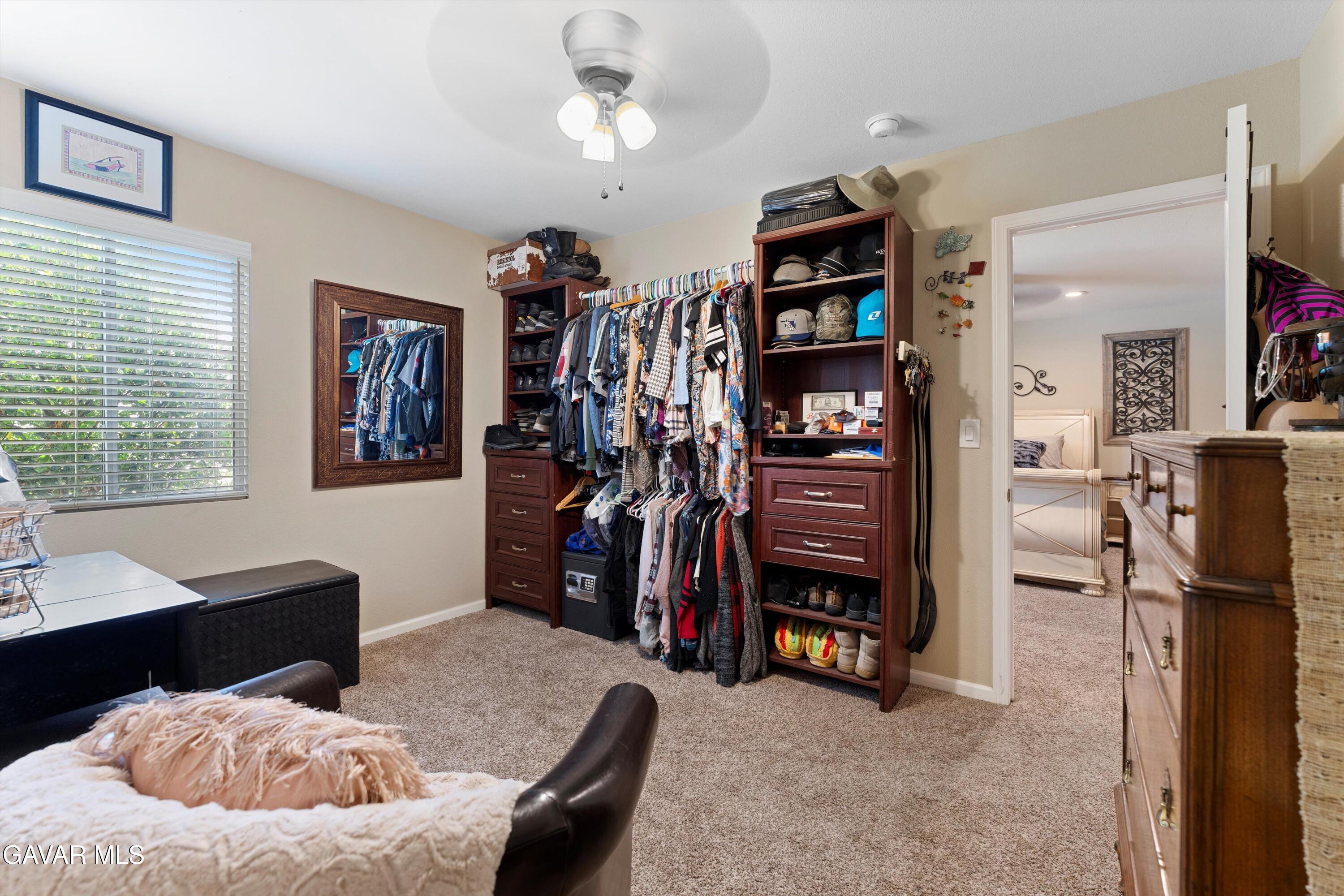 42409 12th Street West Lancaster, CA 93534 - Photo 15 of 20 a bedroom with a bed furniture and a window