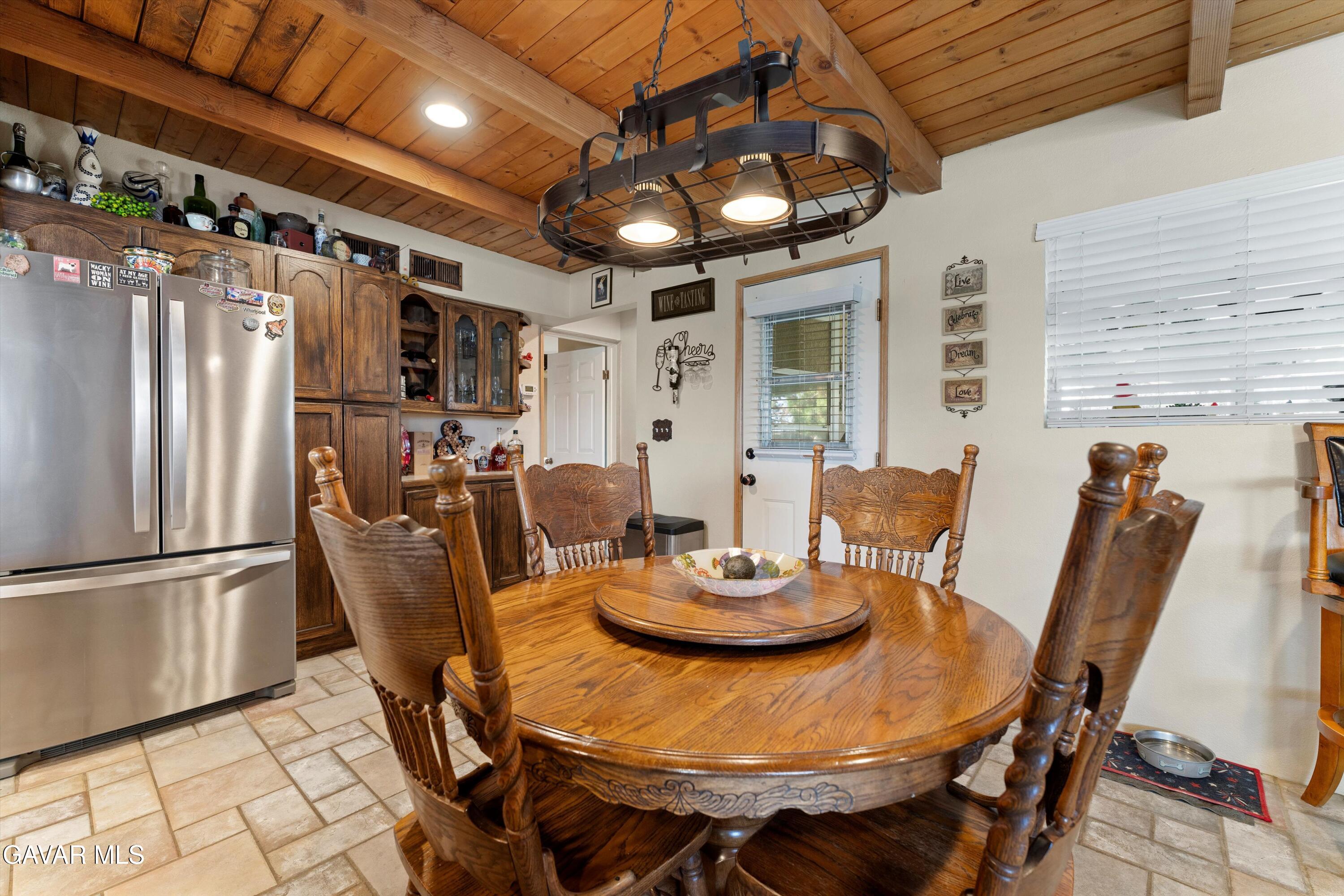 42409 12th Street West Lancaster, CA 93534 - Photo 8 of 20 a view of a dining room with furniture window and wooden floor