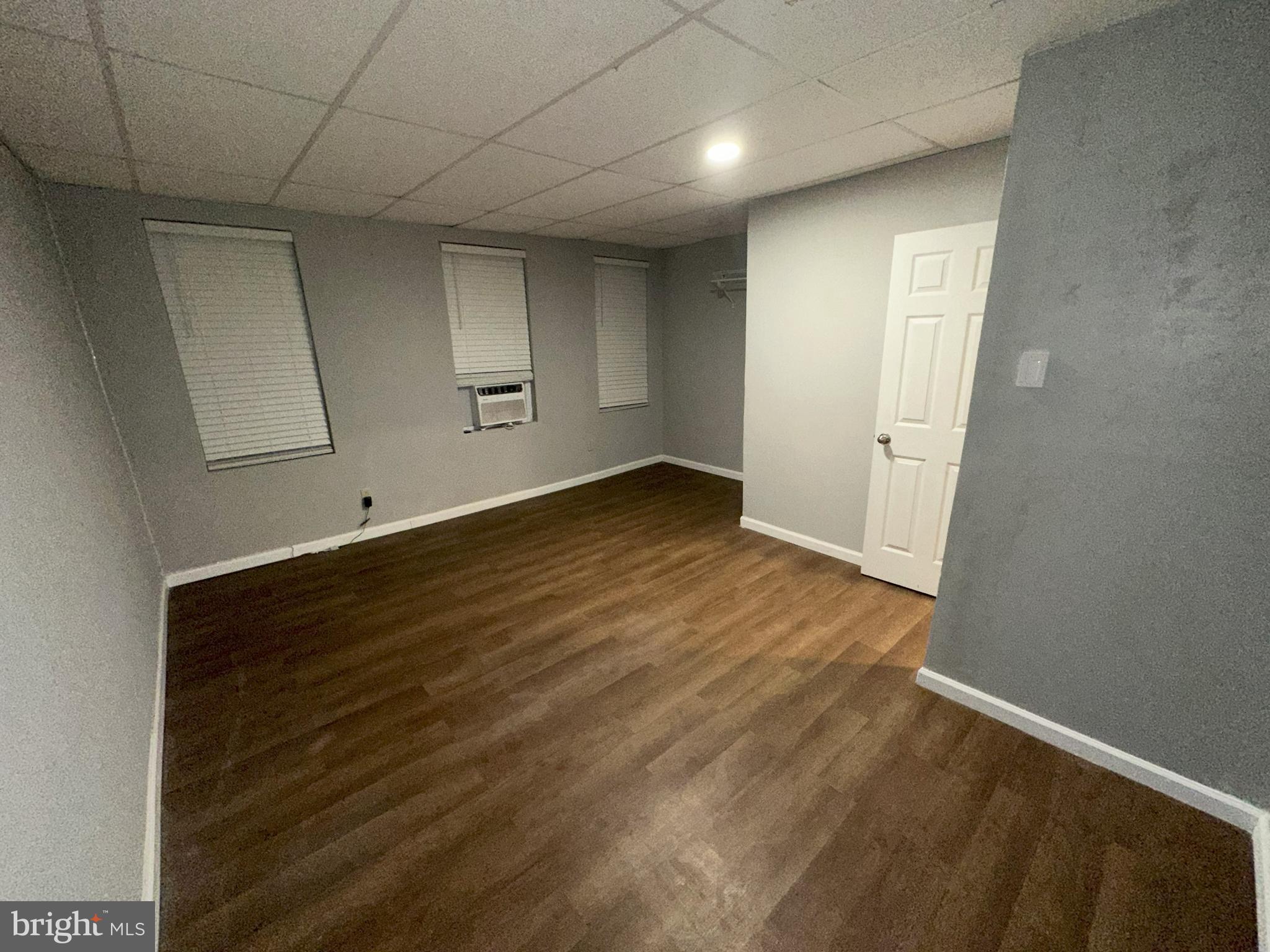 1510 Sycamore Street Curtis Bay, MD 21226 - Photo 17 of 23 wooden floor in an empty room with a window