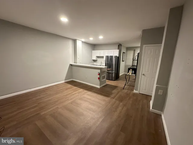 a view of a kitchen with a sink