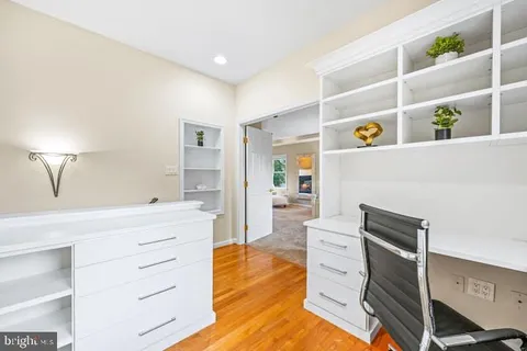 a kitchen with a refrigerator and a stove