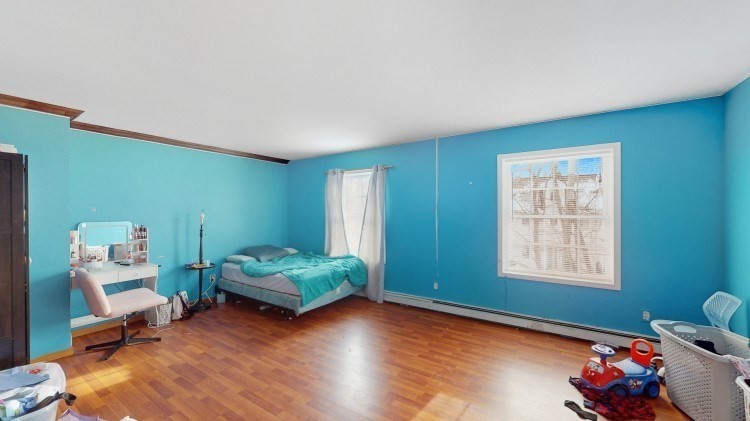 15 Teddy Road Worcester, MA 01603 - Photo 14 of 26 a living room with furniture and a window