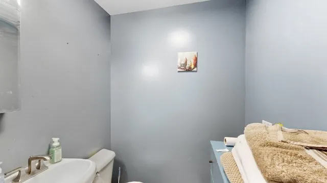 a bathroom with a sink and a toilet