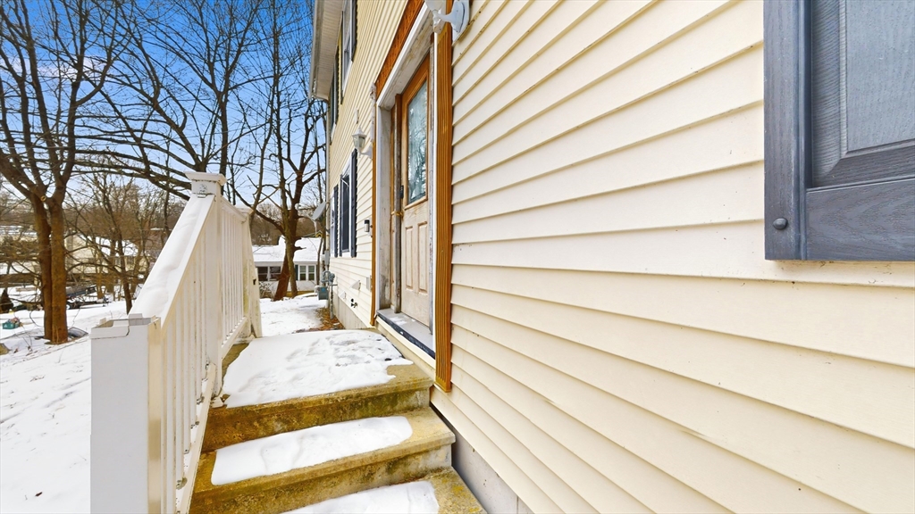 15 Teddy Road Worcester, MA 01603 - Photo 2 of 26 a view of balcony with wooden floor and fence