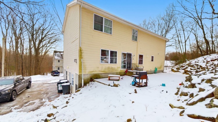 15 Teddy Road Worcester, MA 01603 - Photo 25 of 26 a view of a dinning table and chairs in the patio